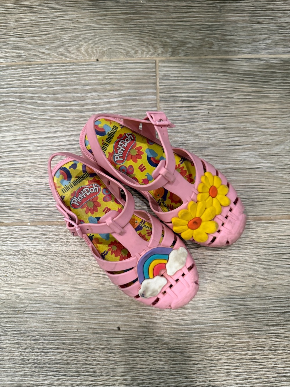 Mini Melissa Pink Jelly Sandals with Rainbow and Yellow Flower Accents